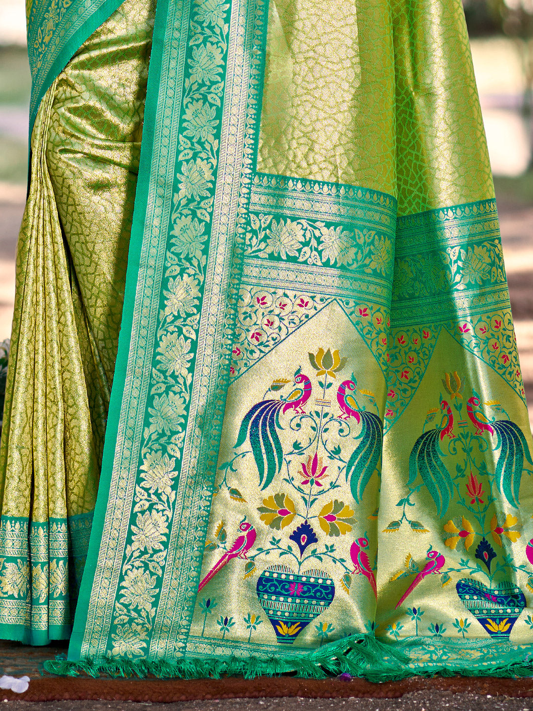 Sutriti Traditional Light Green Kanjivaram Silk Saree with Rich Red Border and Peacock Pallu Design