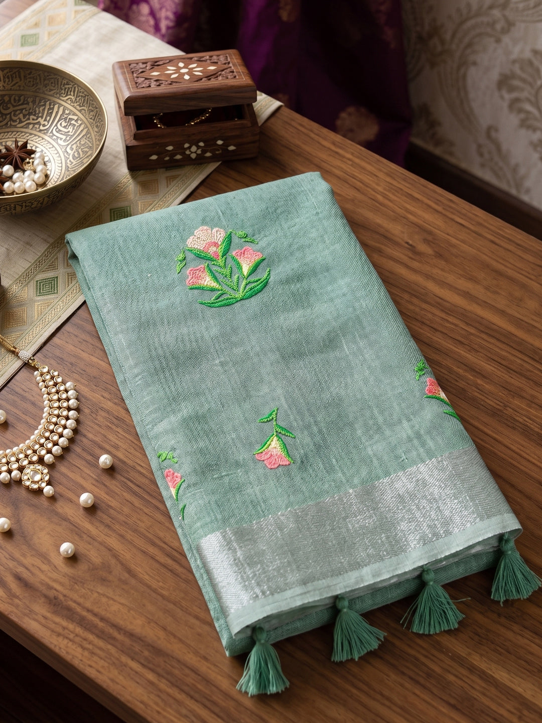 Sutriti Women Sea Green Linen Saree with Floral Embroidery Border & Tassels