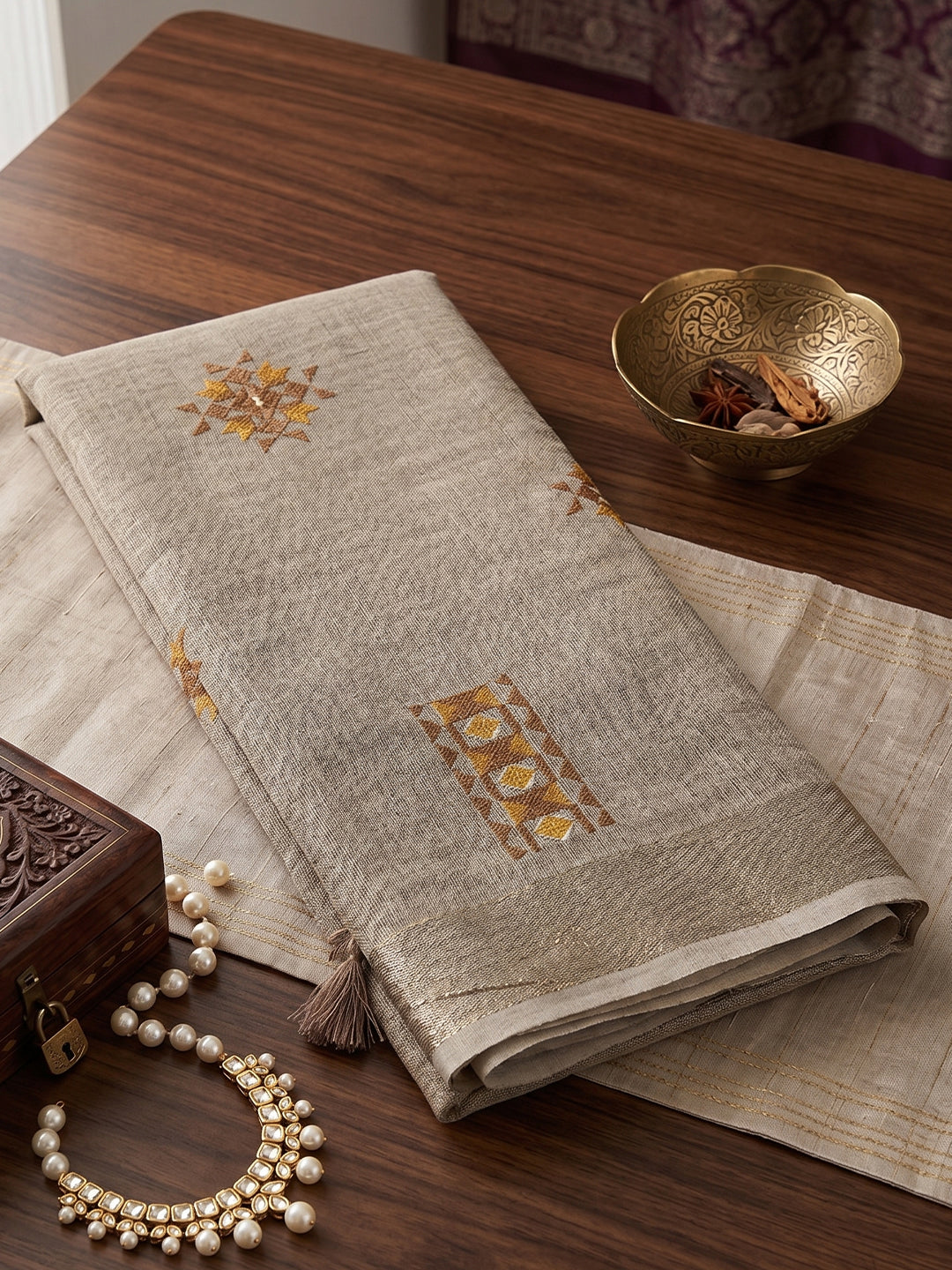 Sutriti Women Brown Linen Saree with Floral Embroidery Border & Tassels