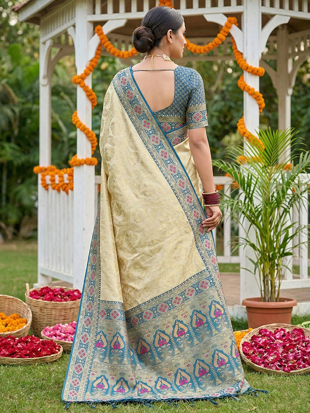 Sutriti Elegant Cream & Teal Soft Silk Kanjivaram Style Saree with Rich Zari Border & Paisley Pallu