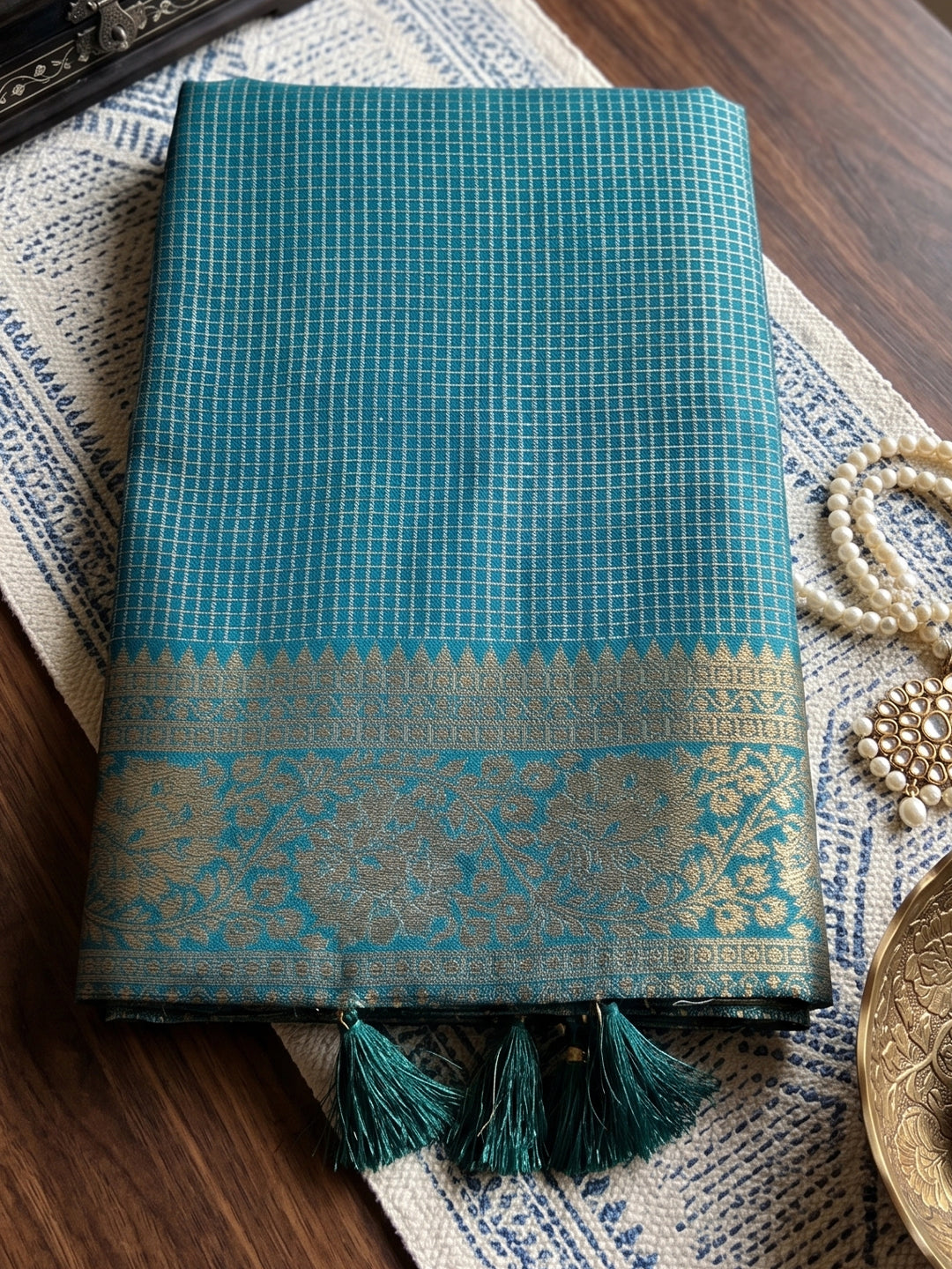 Sutriti Teal Blue Art Silk Saree With Geometric Gold Border | Women's Party Wear