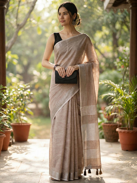 Sutriti Elegant Brown Woven Linen Saree with Contrast Zari Border & Tassels – Soft & Breathable Party Wear
