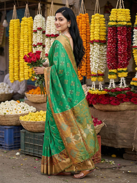 Emerald green woven saree with gold contrast border and printed pallu for festive wear