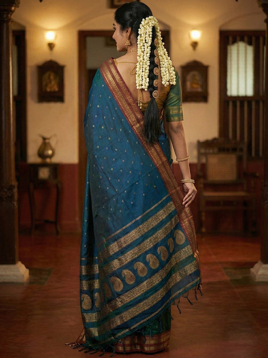 Sutriti The Peacock Hue: Teal Blue Soft Silk Saree with Contrast Red Zari Border