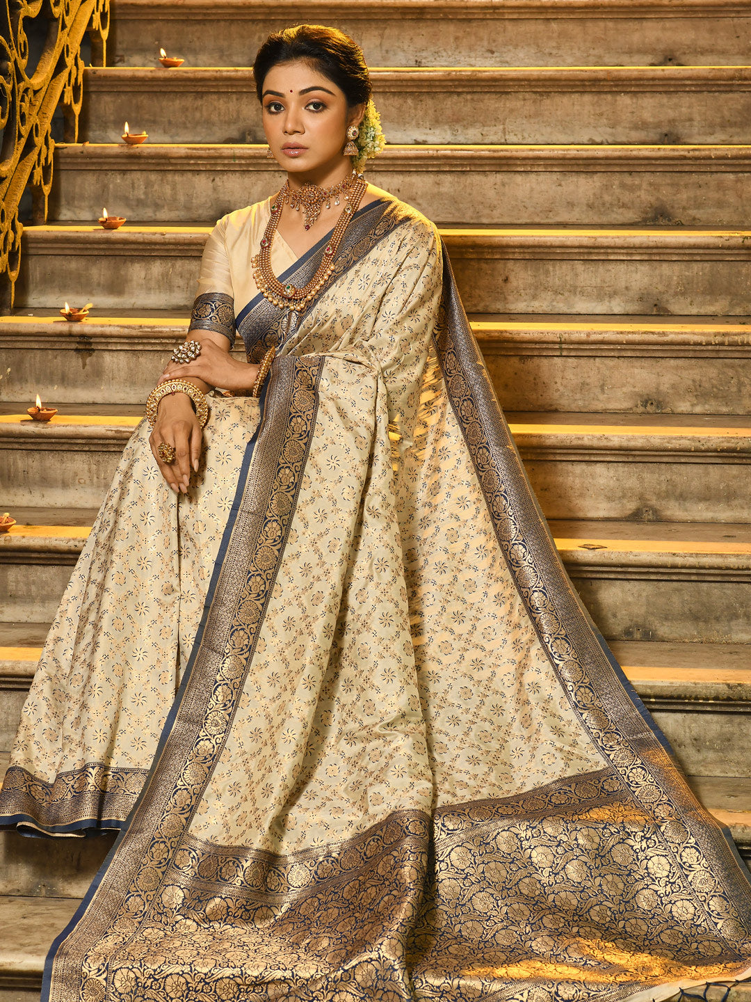 Sutriti Ivory and Navy Blue Banarasi Silk Saree with Golden Zari – Regal Elegance for Timeless Celebrations