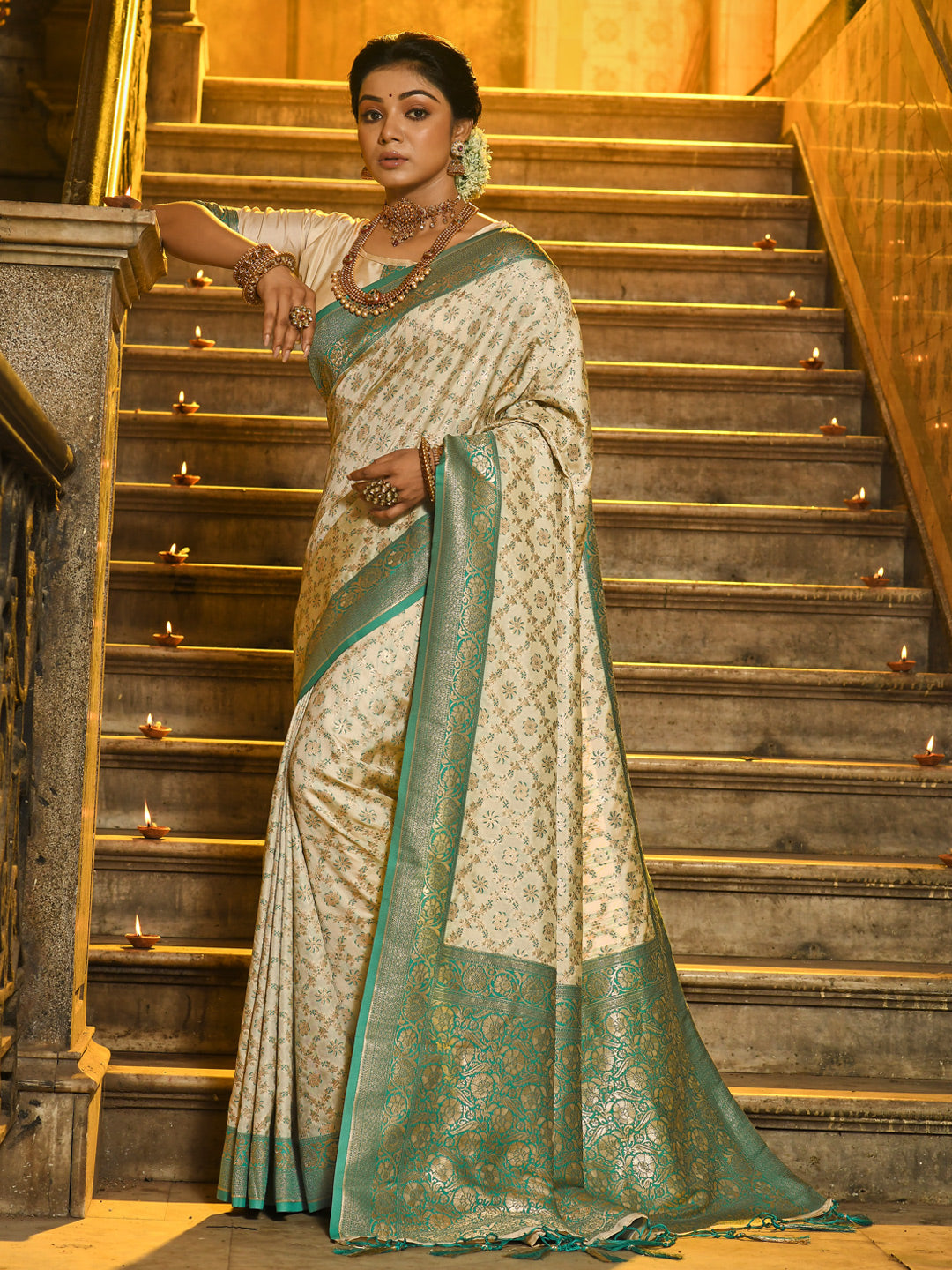 Sutriti Ivory and Sea Green Banarasi Silk Saree with Golden Zari – Regal Elegance for Timeless Celebrations