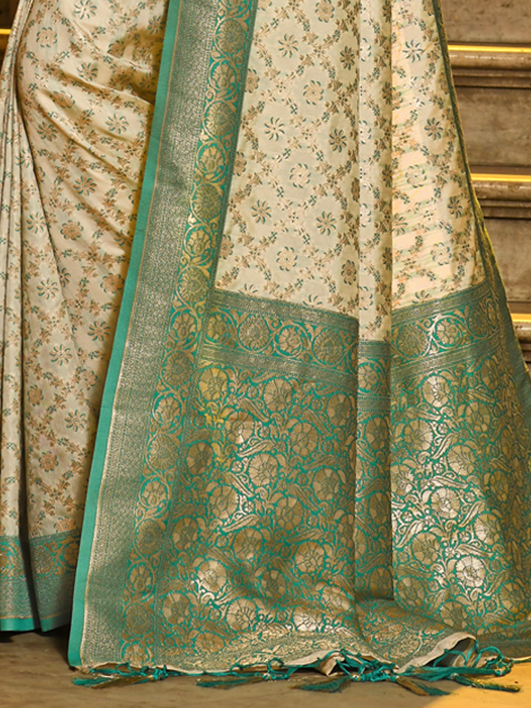 Sutriti Ivory and Sea Green Banarasi Silk Saree with Golden Zari – Regal Elegance for Timeless Celebrations