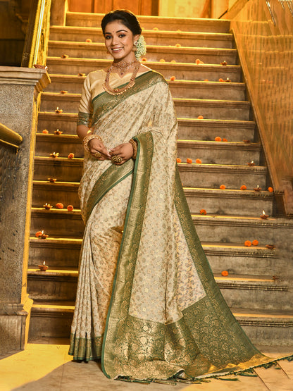 Sutriti Ivory and Green Banarasi Silk Saree with Golden Zari – Regal Elegance for Timeless Celebrations