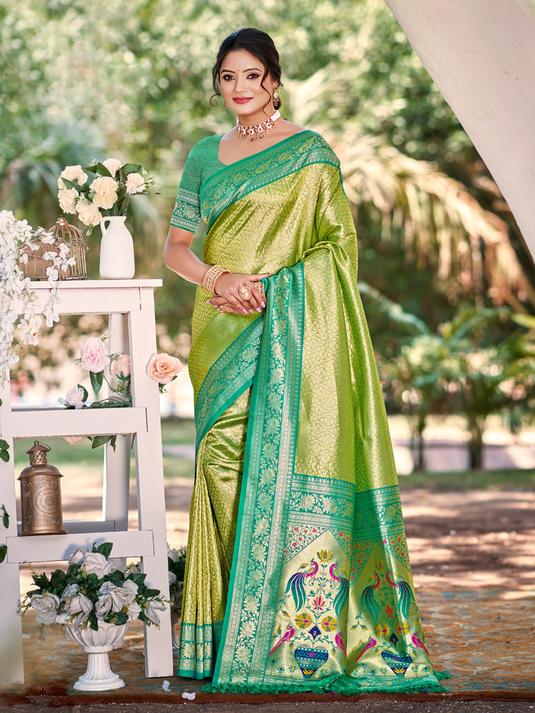 Sutriti Traditional Light Green Kanjivaram Silk Saree with Rich Red Border and Peacock Pallu Design