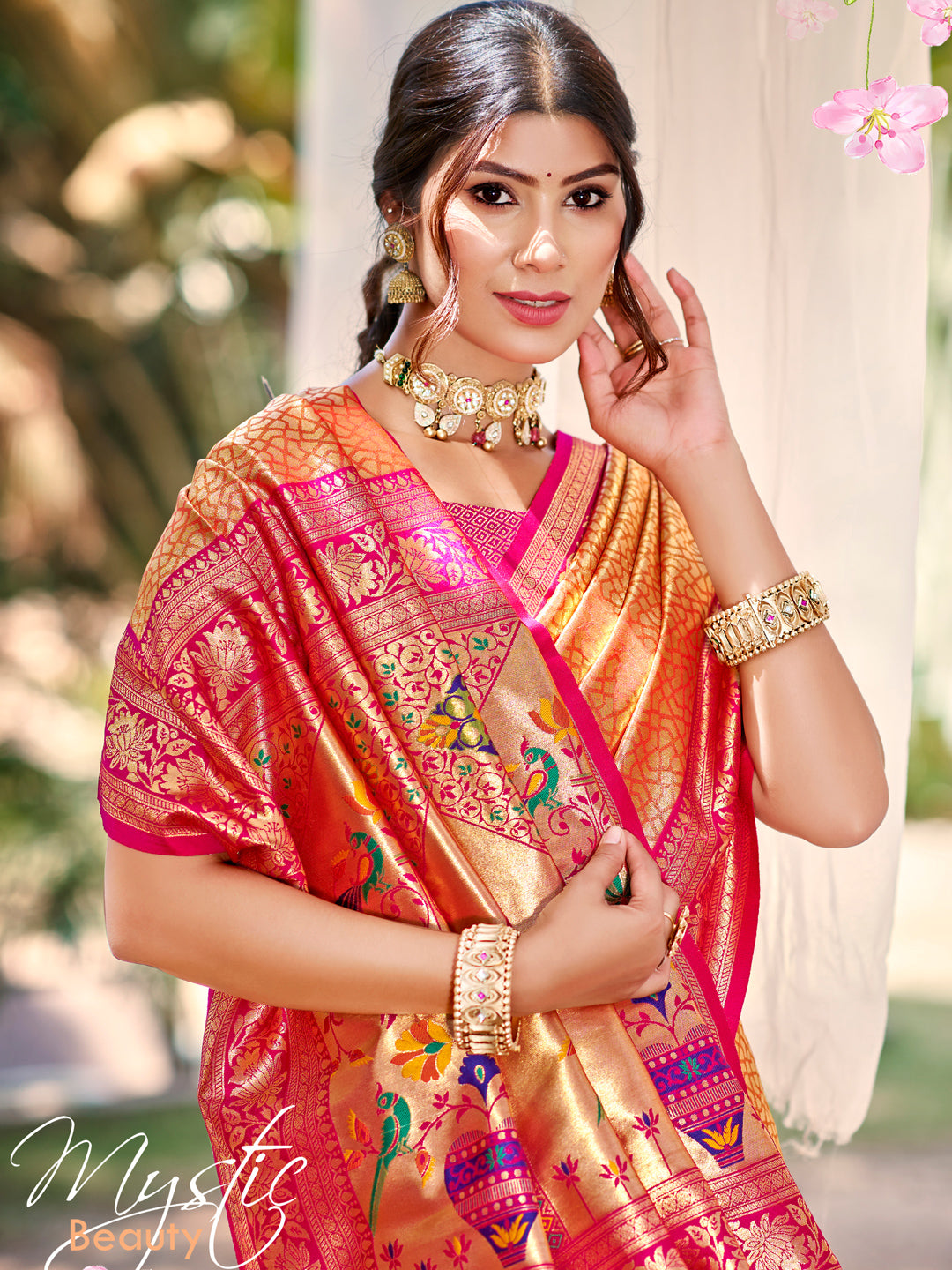 Sutriti Traditional Orange Kanjivaram Silk Saree with Rich Red Border and Peacock Pallu Design