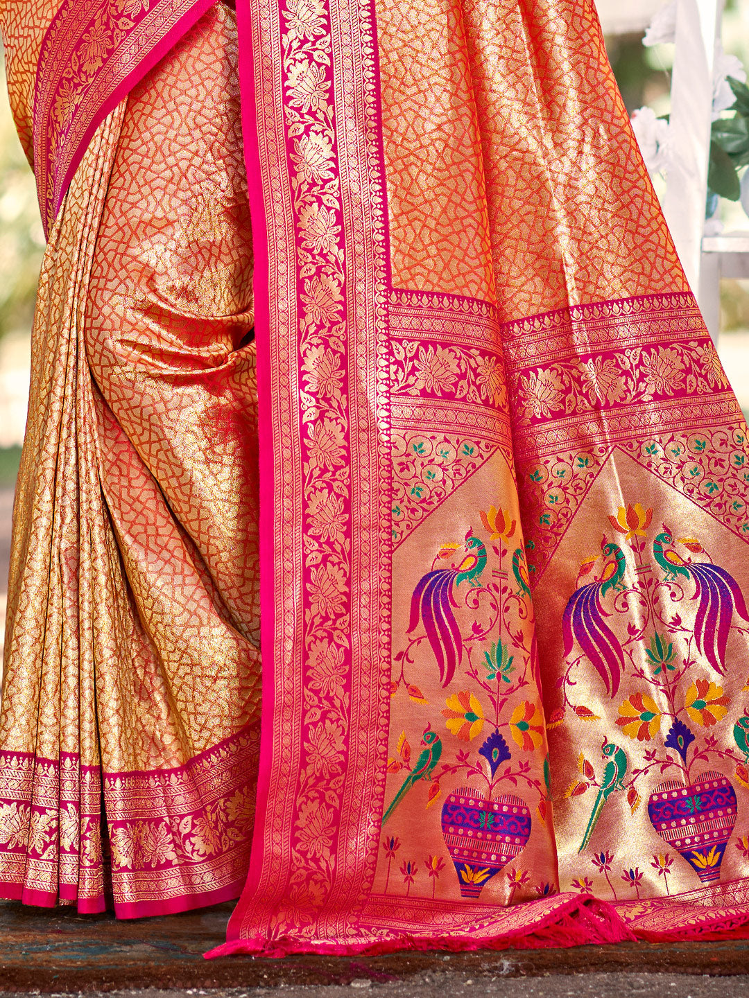 Sutriti Traditional Orange Kanjivaram Silk Saree with Rich Red Border and Peacock Pallu Design