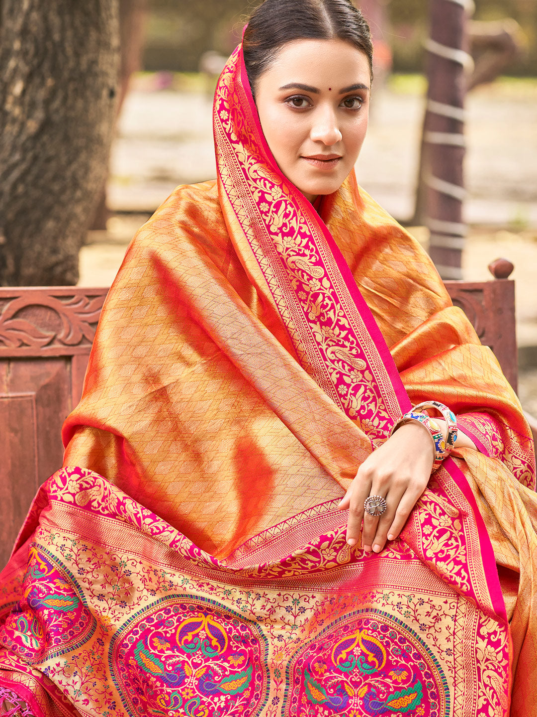 Sutriti Traditional Kanjivaram Silk Saree in Orange with Grand Zari Pallu and Matching Blouse