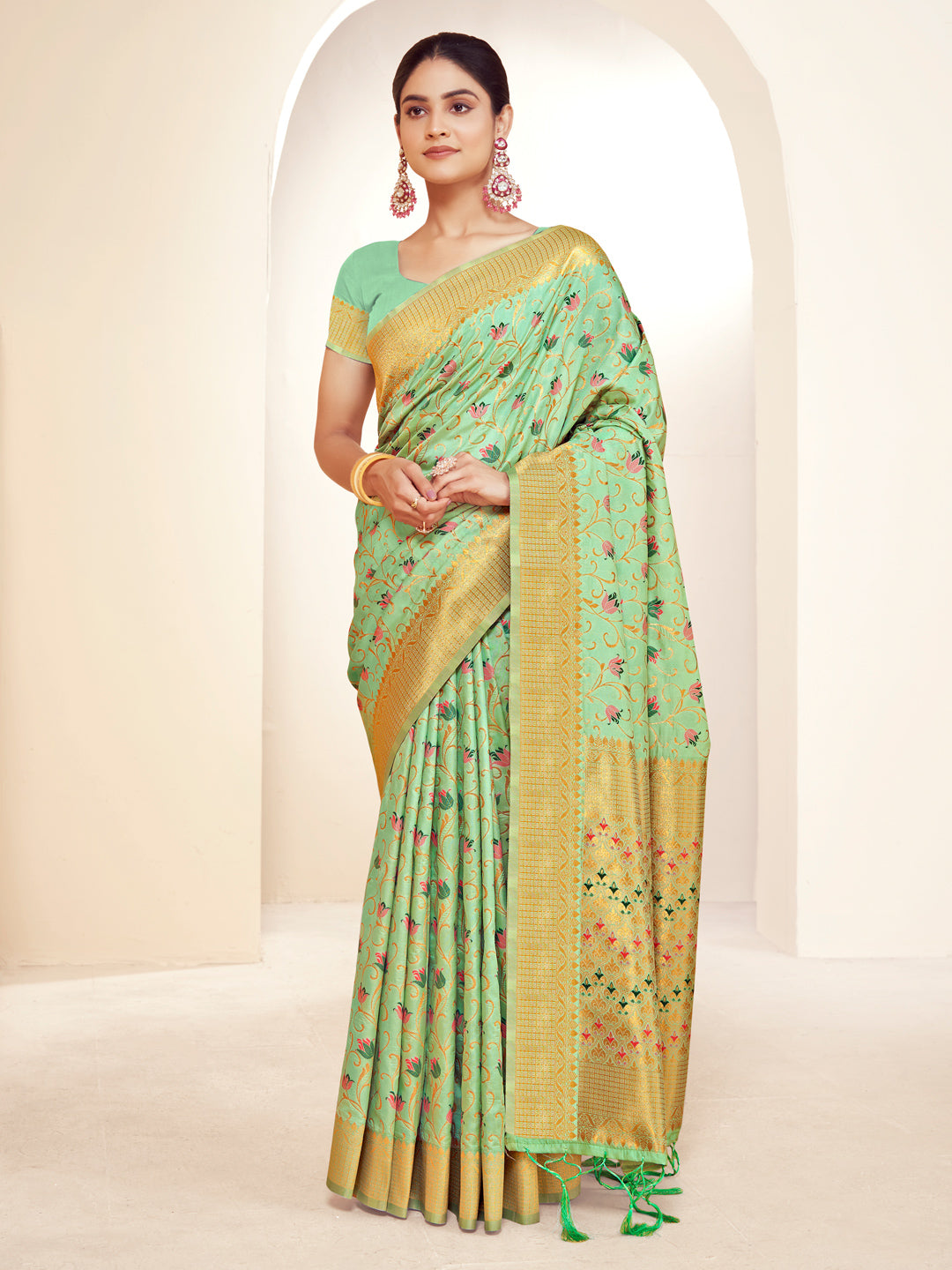 Sutriti Peach Green Banarasi Silk Saree with Golden Zari Weaving & Floral Jaal for Wedding Wear