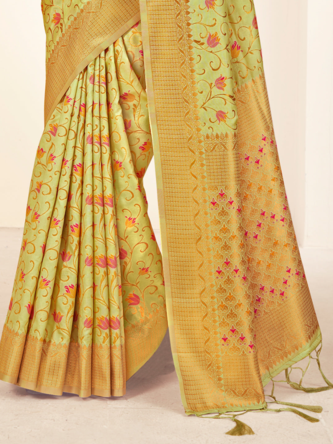 Sutriti Peach Light Green Banarasi Silk Saree with Golden Zari Weaving & Floral Jaal for Wedding Wear