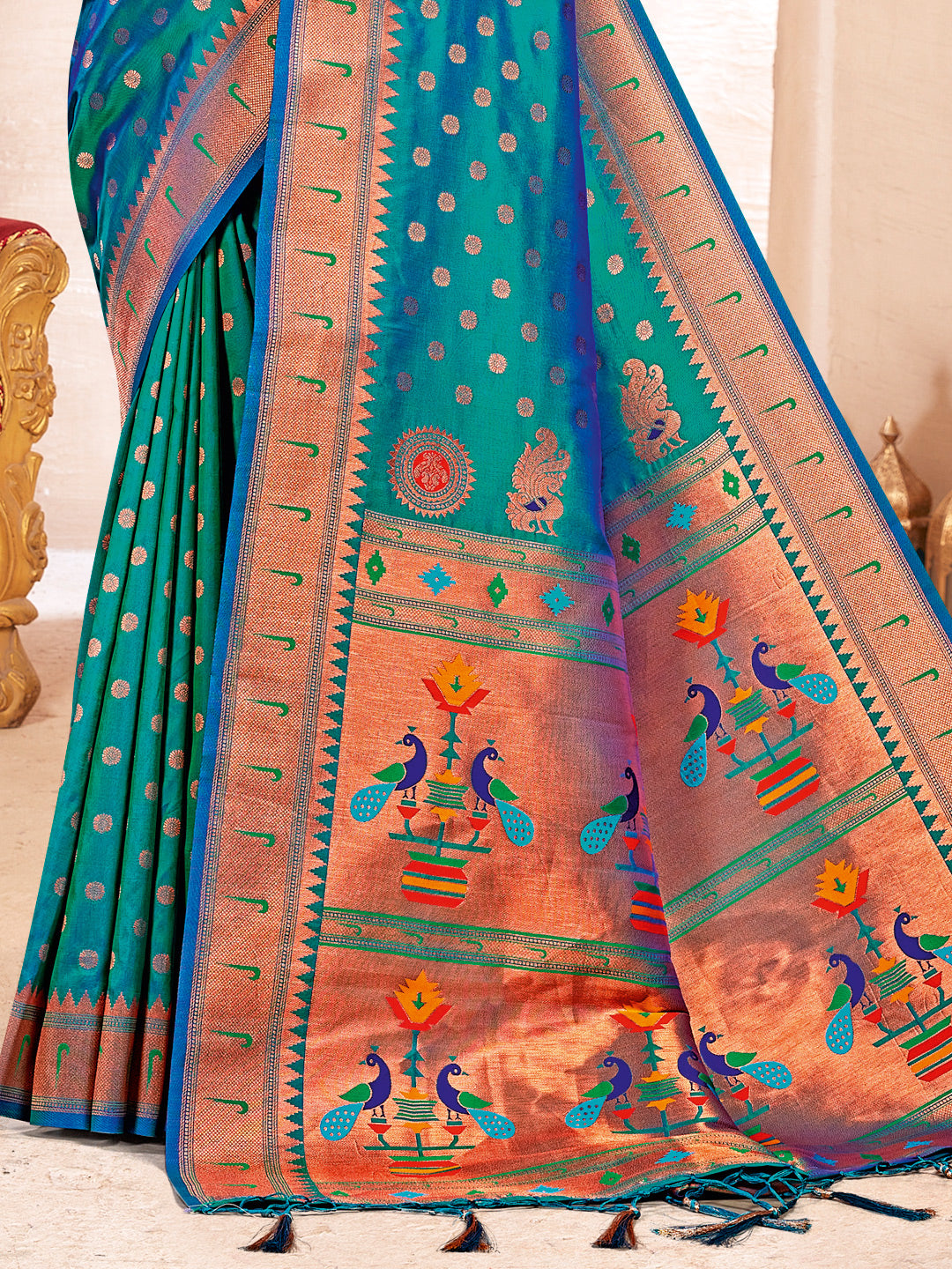 Sutriti Sea Green Kanjivaram Silk Saree with Golden Zari and Colorful Peacock Woven Pallu Design