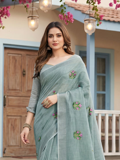 Sutriti Women Sea Green Linen Saree with Floral Embroidery Border & Tassels