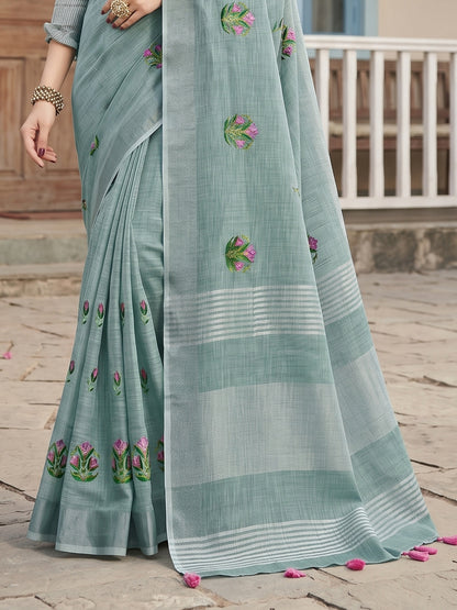 Sutriti Women Sea Green Linen Saree with Floral Embroidery Border & Tassels