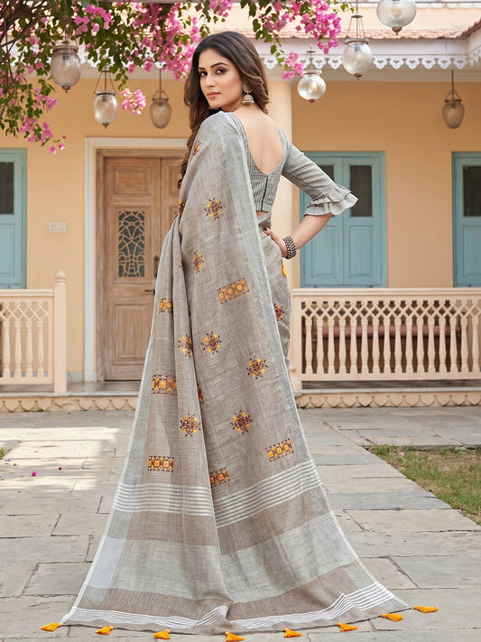 Sutriti Women Brown Linen Saree with Floral Embroidery Border & Tassels