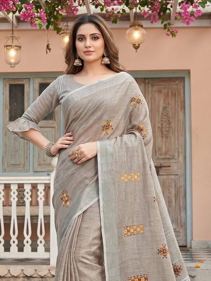 Sutriti Women Brown Linen Saree with Floral Embroidery Border & Tassels