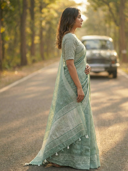 Sutriti Women Teal Green & Silver-Toned Woven Design Linen Blend Saree