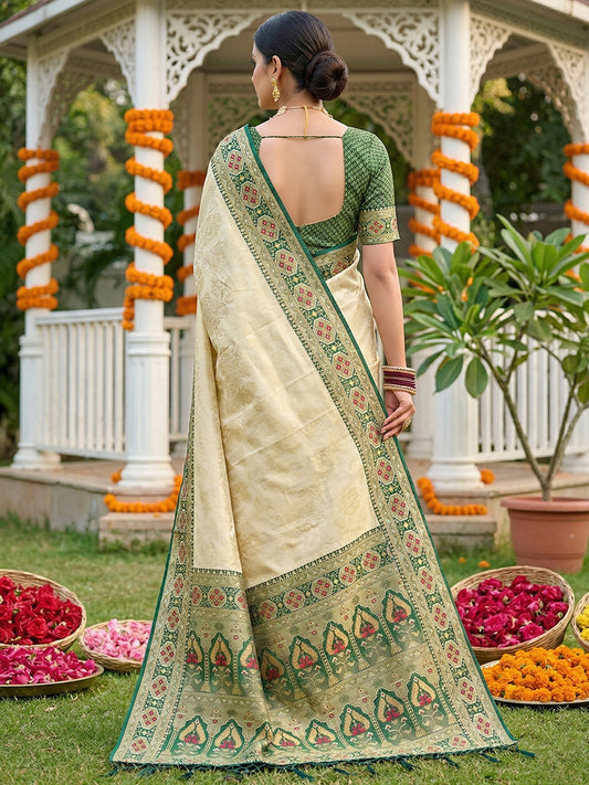 Sutriti Elegant Cream & Green Soft Silk Kanjivaram Style Saree with Rich Zari Border & Paisley Pallu