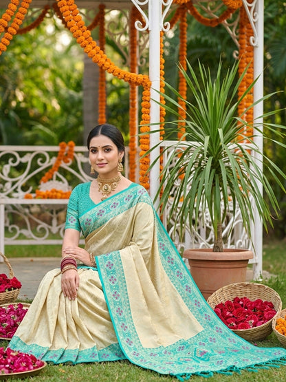 Sutriti Elegant Cream & Turquoise Soft Silk Kanjivaram Style Saree with Rich Zari Border & Paisley Pallu