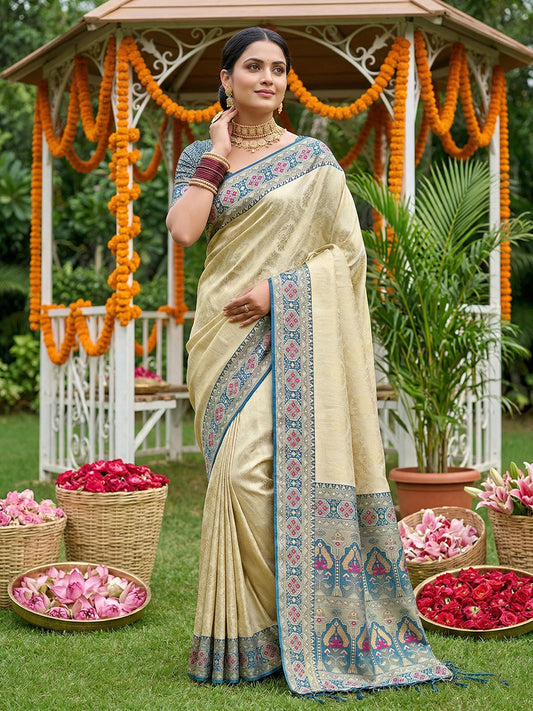 Sutriti Elegant Cream & Teal Soft Silk Kanjivaram Style Saree with Rich Zari Border & Paisley Pallu