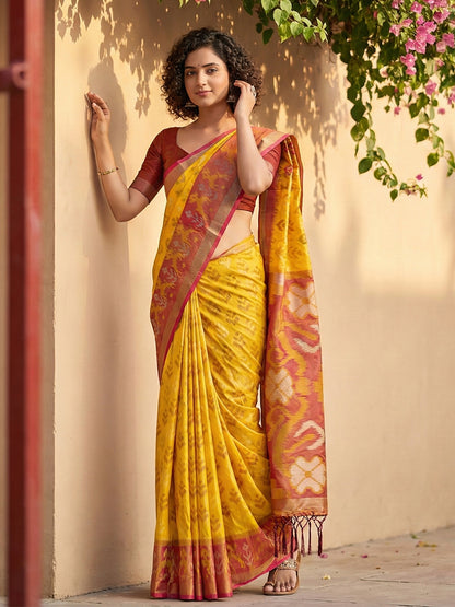 Mustard yellow Patola inspired woven saree with maroon contrast border and tassel pallu for women