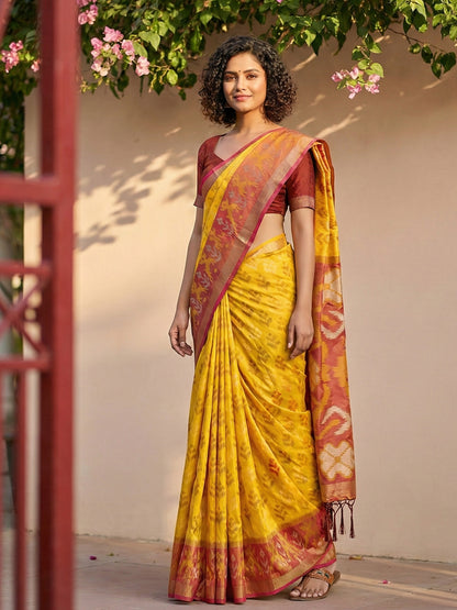 Mustard yellow Patola inspired woven saree with maroon contrast border and tassel pallu for women