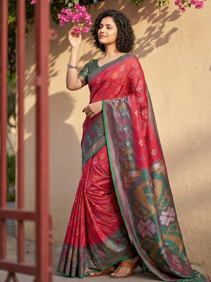 Cherry red Patola inspired woven saree with contrast border and tassel pallu for wedding festive wear