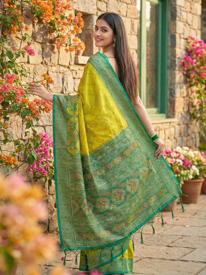 Lime yellow woven saree with teal contrast border and rich pallu for festive wear