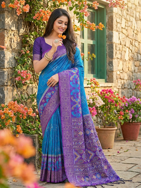 Royal blue woven saree with purple contrast border and rich pallu for women