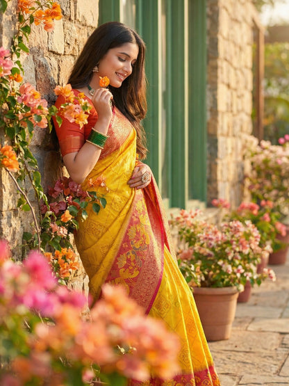 Mustard yellow woven saree with rust orange contrast border and rich pallu for festive wear