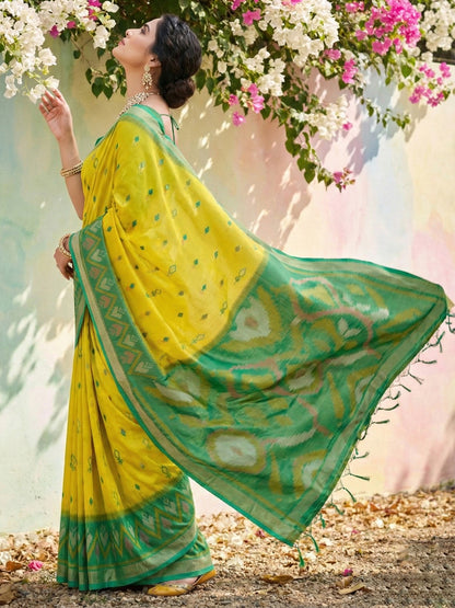 Mustard yellow woven saree with green contrast border and rich pallu for haldi festive wear