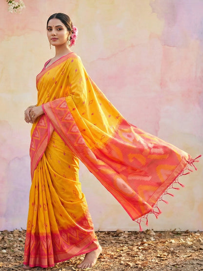 Mustard yellow woven saree with pink contrast border and rich pallu for festive wear