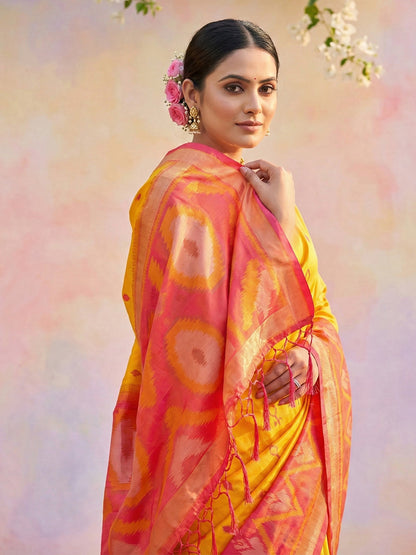 Mustard yellow woven saree with pink contrast border and rich pallu for festive wear