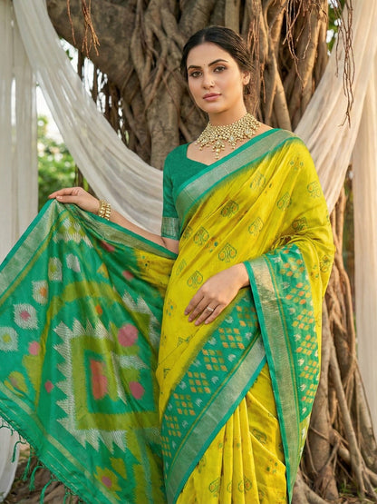 Lime yellow woven saree with green contrast border and rich pallu for haldi festive wear