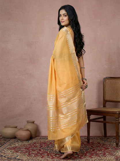 Sutriti mustard yellow tissue silk gold zari border wedding saree minimal border collection