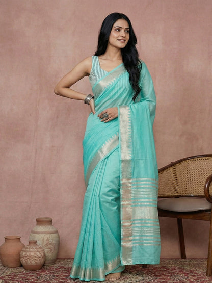 Sutriti turquoise tissue silk gold zari border wedding saree minimal border collection