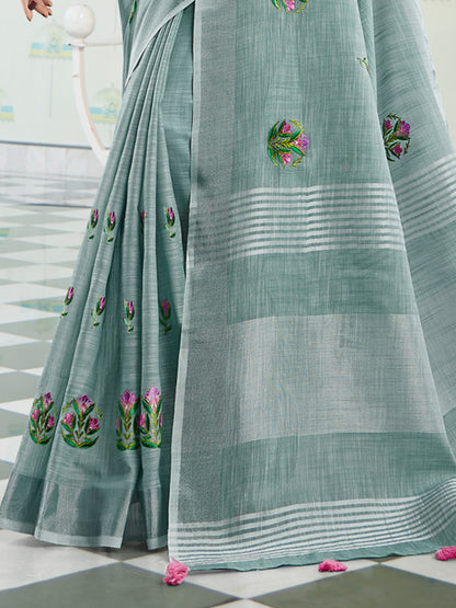 Sutriti Women Sea Green Linen Saree with Floral Embroidery Border & Tassels