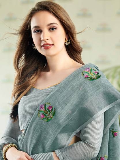 Sutriti Women Sea Green Linen Saree with Floral Embroidery Border & Tassels