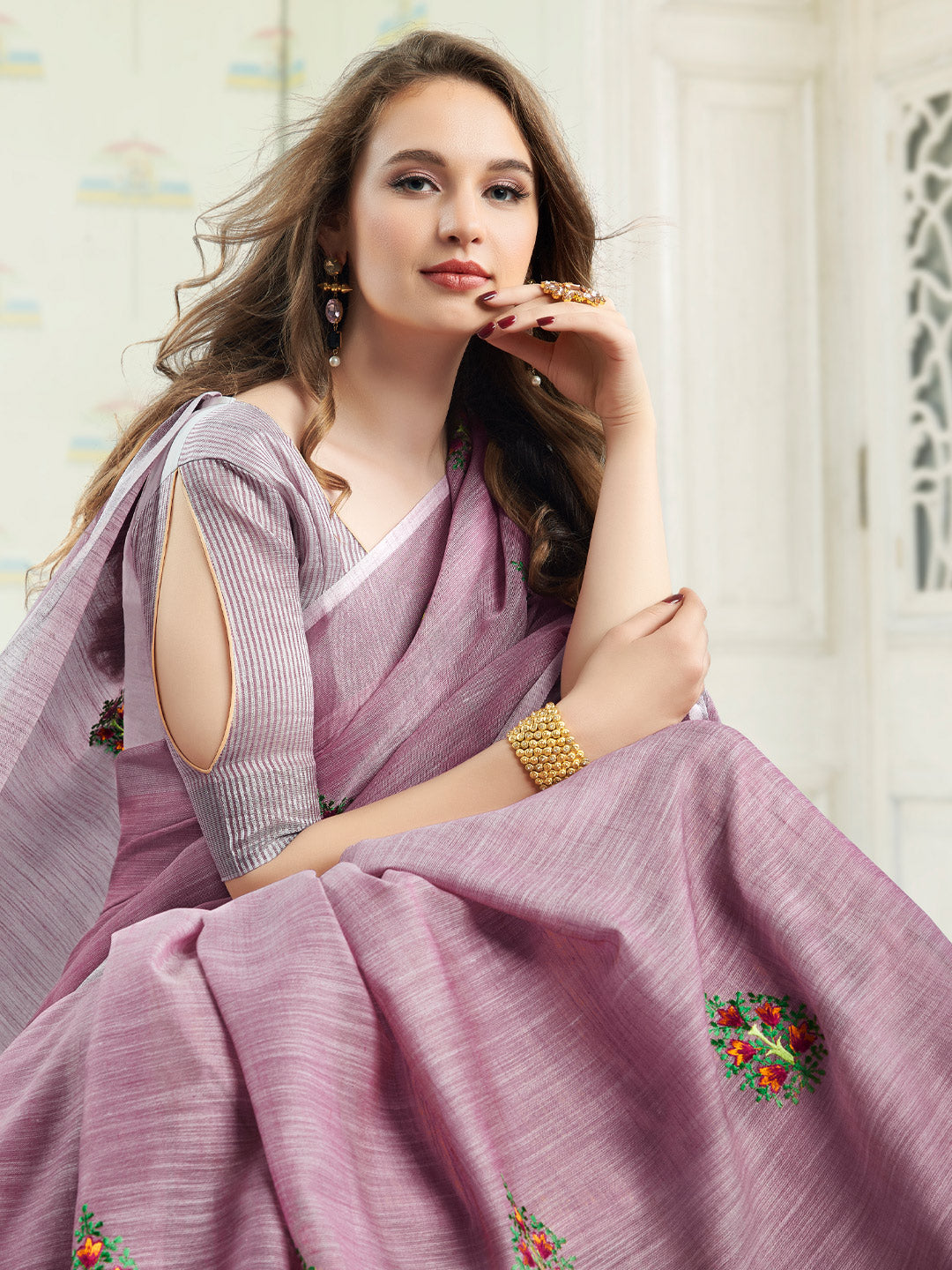 Sutriti Women Blue Linen Saree with Floral Embroidery Border & Tassels
