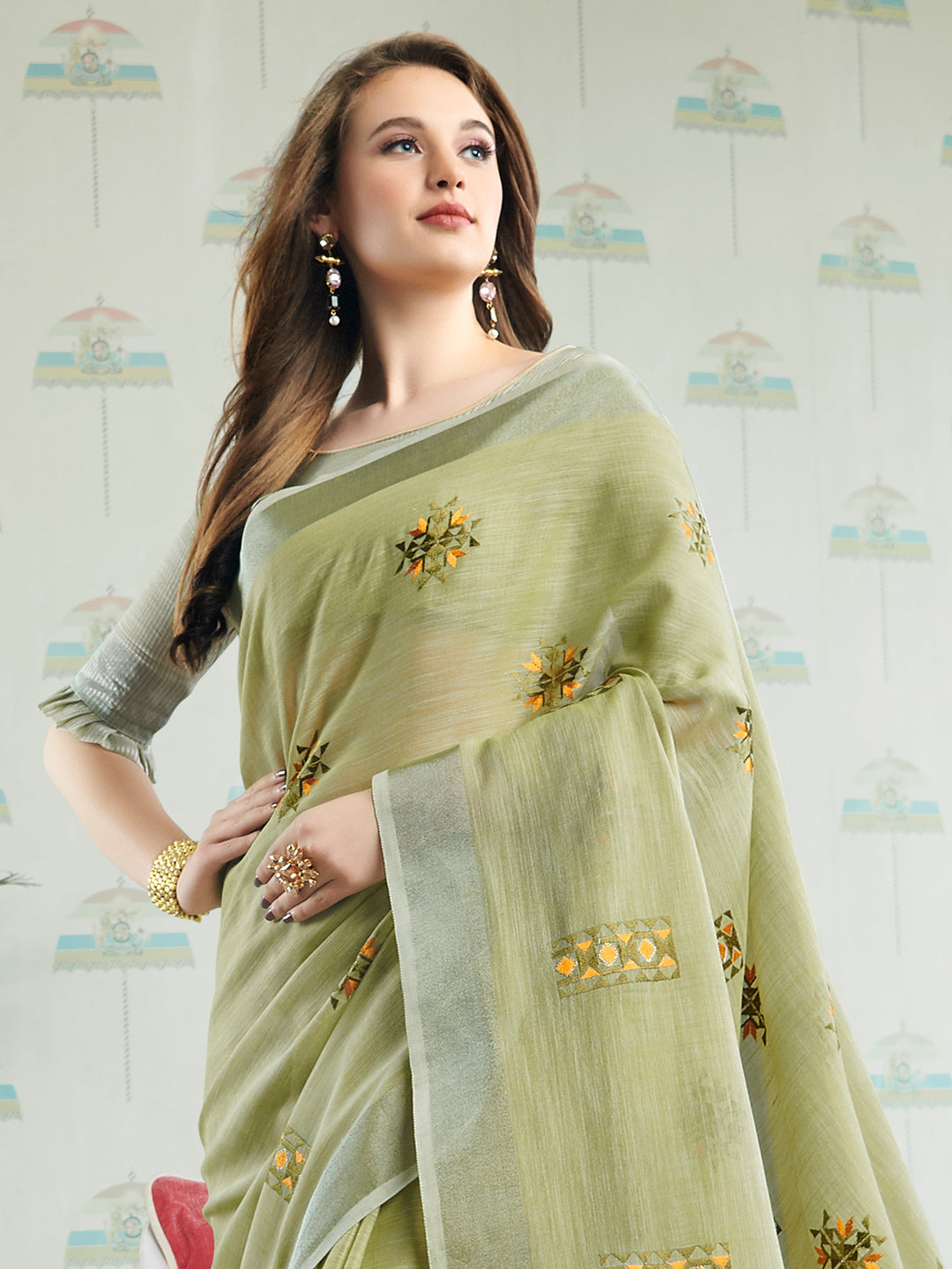 Sutriti Women Light Green Linen Saree with Floral Embroidery Border & Tassels