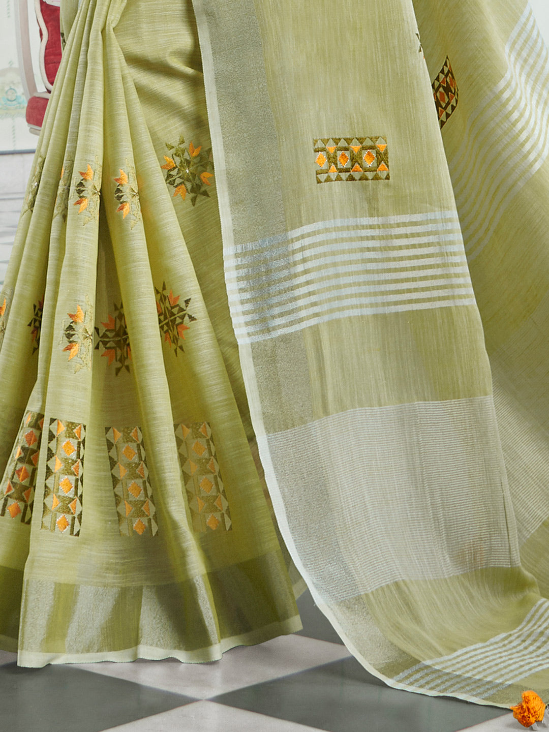 Sutriti Women Light Green Linen Saree with Floral Embroidery Border & Tassels