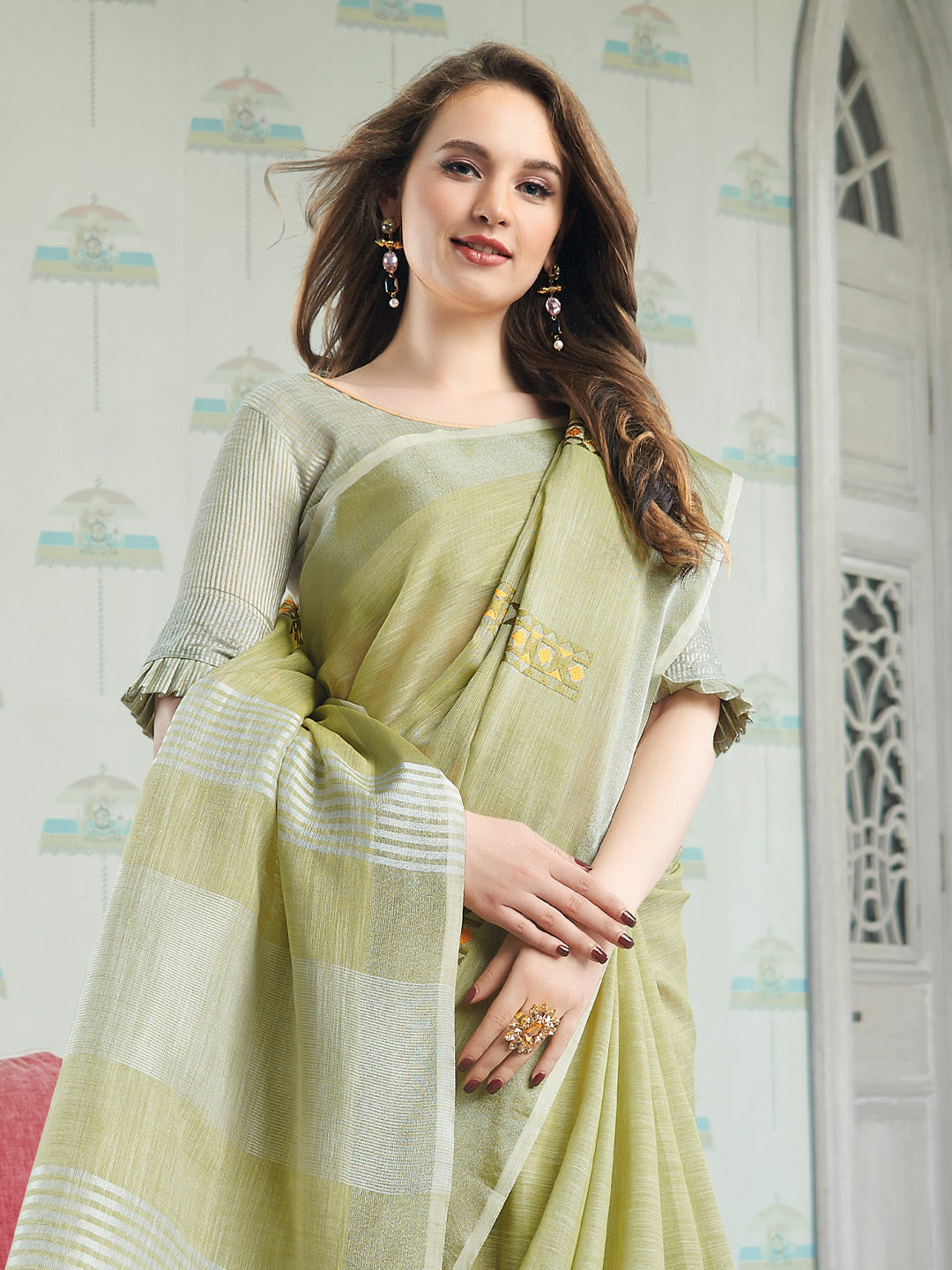 Sutriti Women Light Green Linen Saree with Floral Embroidery Border & Tassels