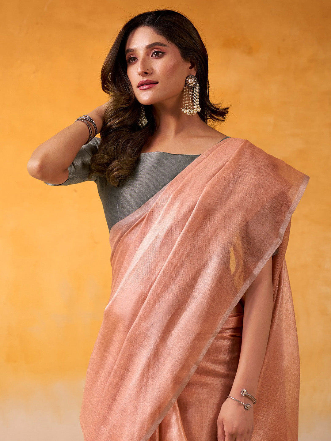 Sutriti Women Peach & Grey Solid Tissue Linen Saree with Zari Border