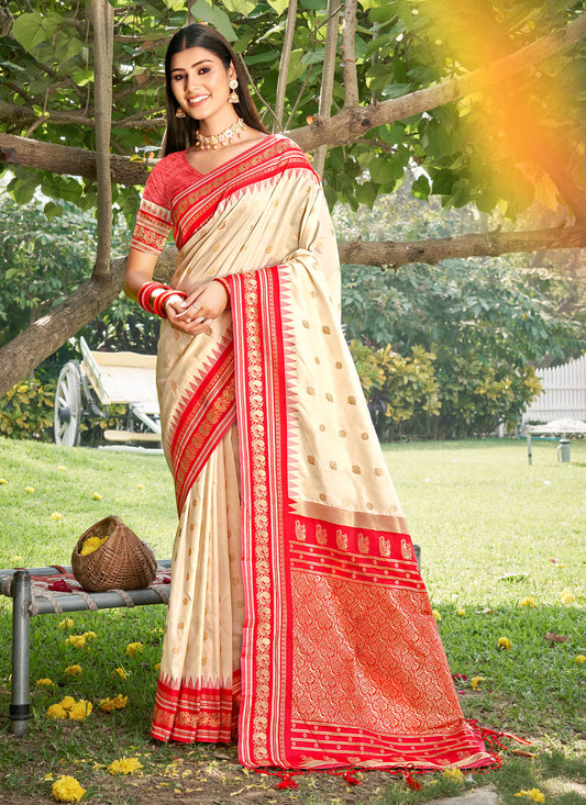 Sutriti Graceful Cream Banarasi Silk Saree with Golden Zari Woven Border & Floral Jaal – Wedding & Festive Wear