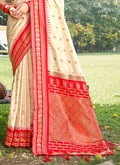Sutriti Graceful Cream Banarasi Silk Saree with Golden Zari Woven Border & Floral Jaal – Wedding & Festive Wear
