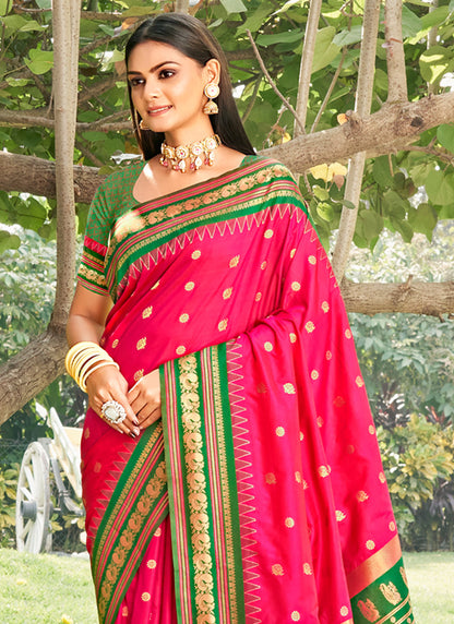 Sutriti Graceful Pink Banarasi Silk Saree with Golden Zari Woven Border & Floral Jaal – Wedding & Festive Wear