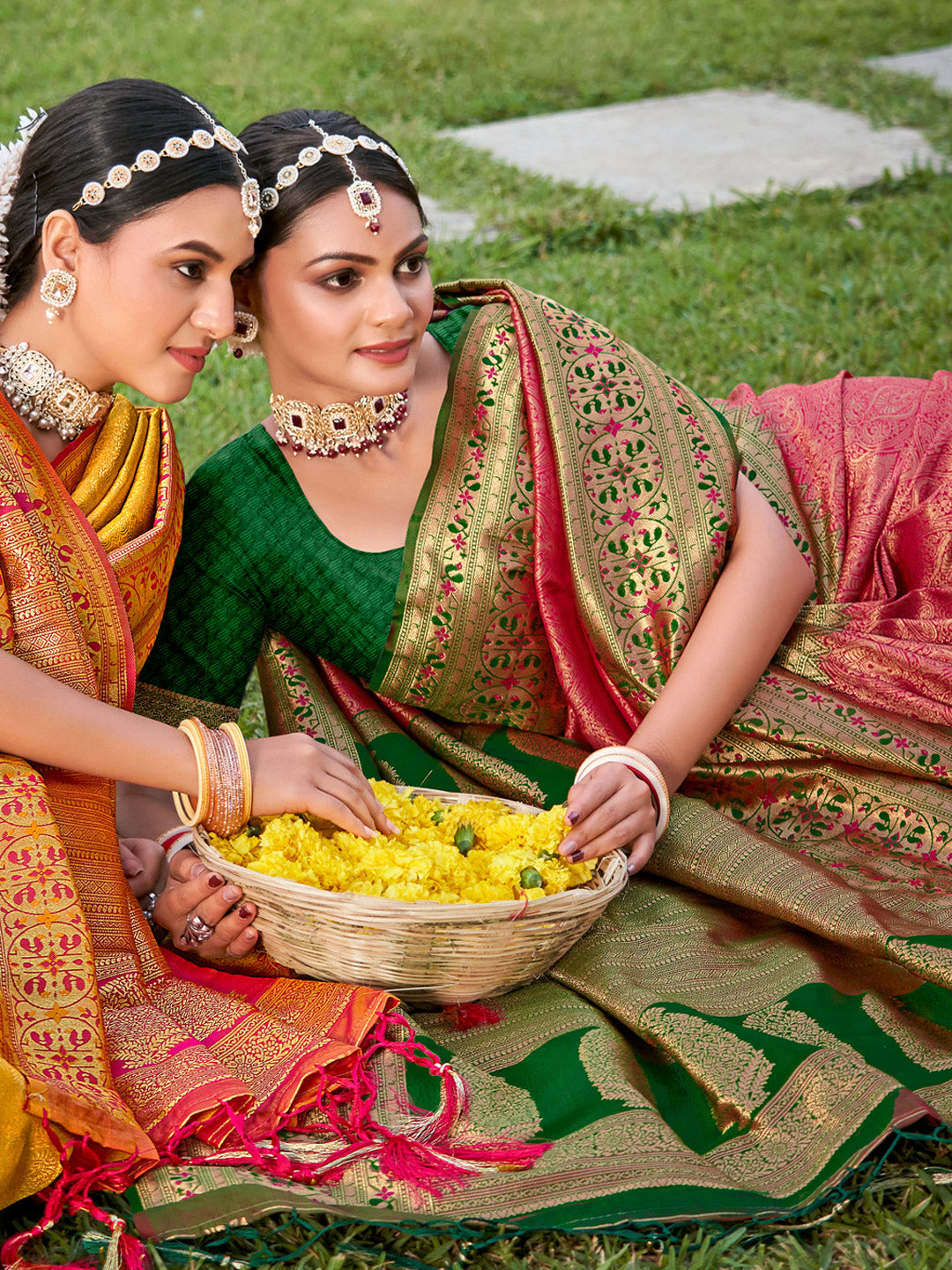 Rani pink zari woven saree for women with green contrast border and heavy pallu